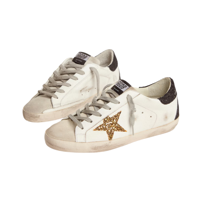 Golden Goose Women’s Super-Star in nappa leather with gold glitter star and black glitter heel tab.